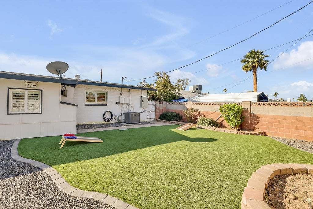 Turf with corn hole game
